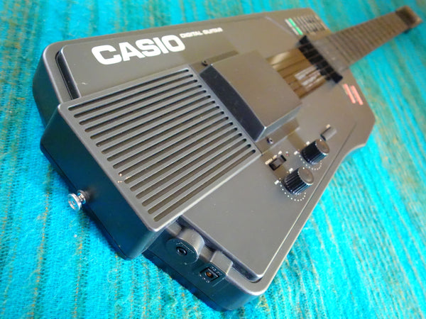 CASIO DG-1 Digital Guitar Synthesizer - Serviced - w/ Original Strap, AC Adapter - H009